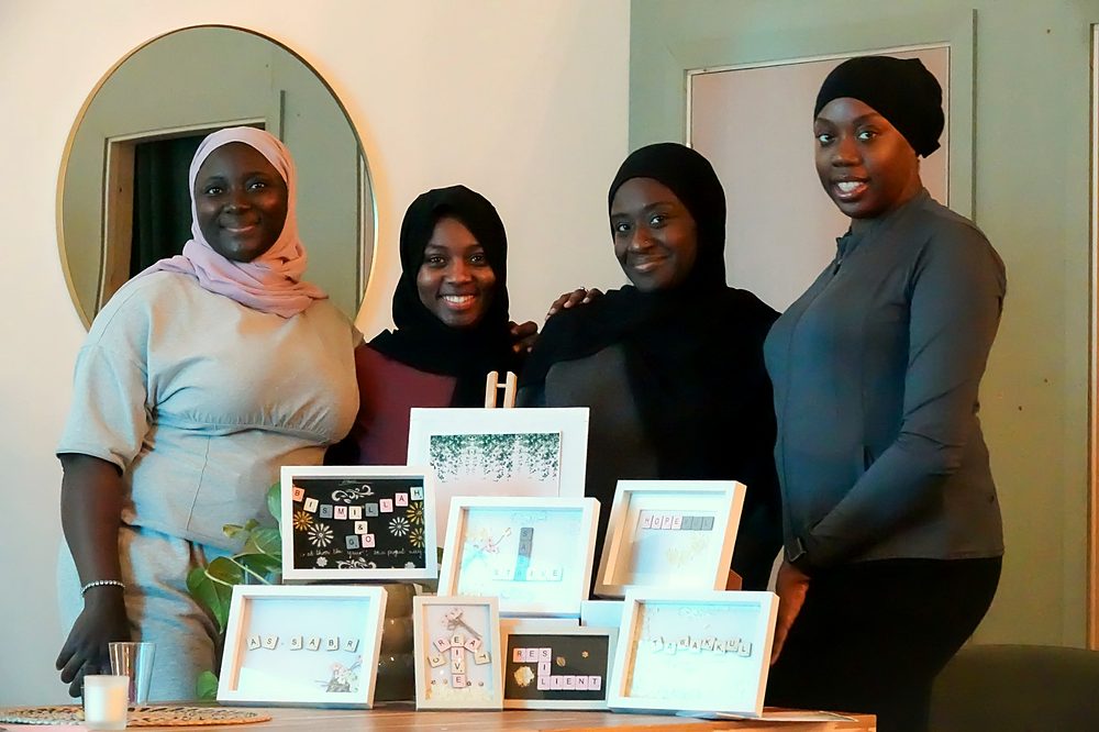 Women with their framed words at Setting Your Energy for 2026